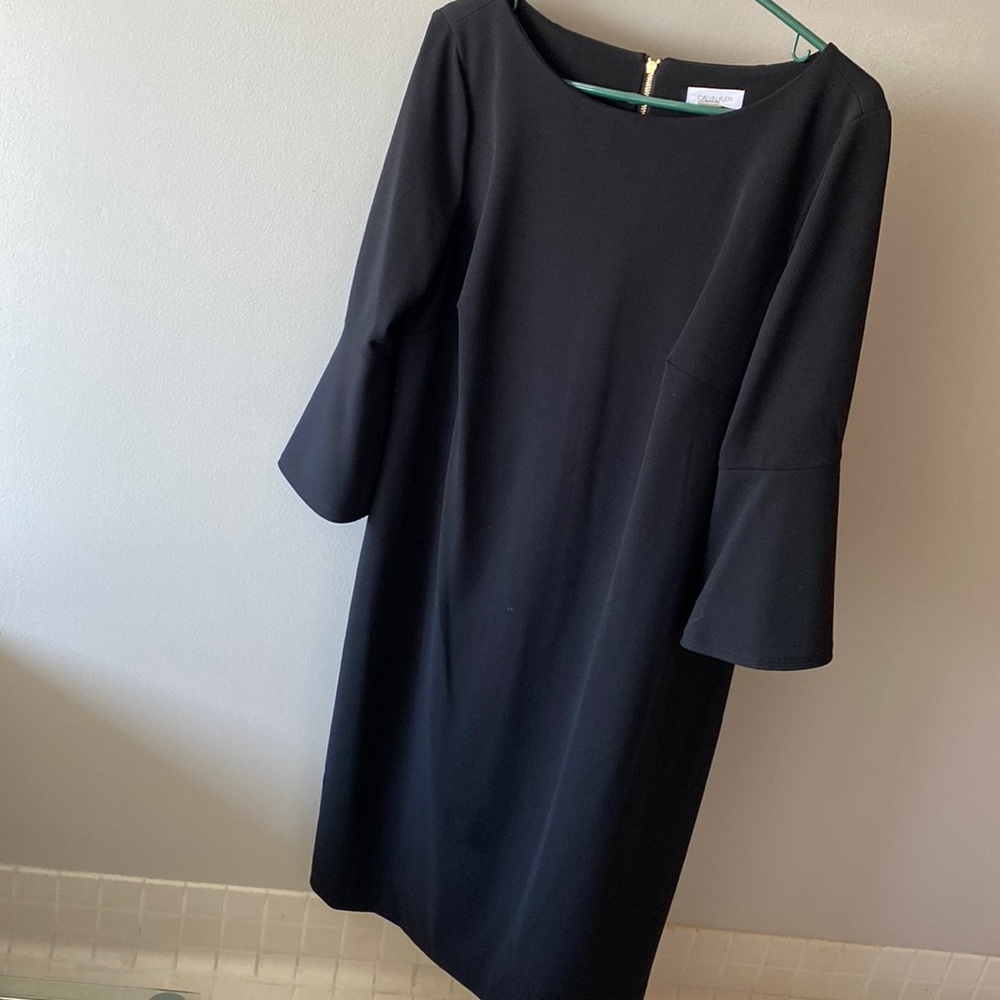 Black bell sleeve sheath dress